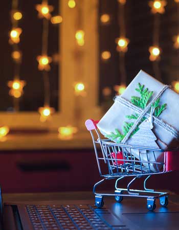 online-shopping-concept-miniature-shopping-cart-wi-KKZBBTK